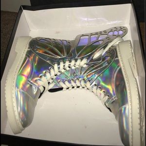 Club Exx Metamorphosis boots by Dolls Kill